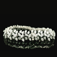 The Infinite Lumière Cuff | white-gold bracelet with EF color and VVS-VS clarity diamonds